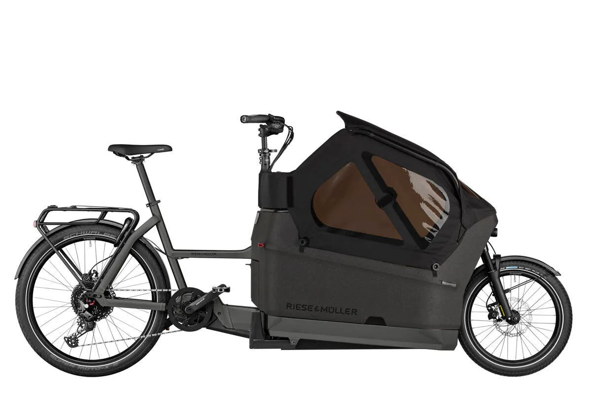 Riese & Müller Packster2 70 cargo e-bike in urban grey matt with black buggy enclosure showing tinted window panel, side view.