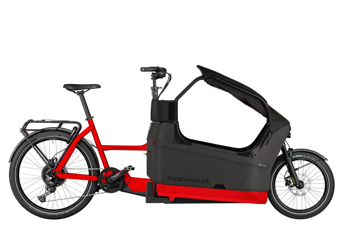 Riese & Müller Packster2 70 cargo e-bike in chili matt with black buggy enclosure, side view.