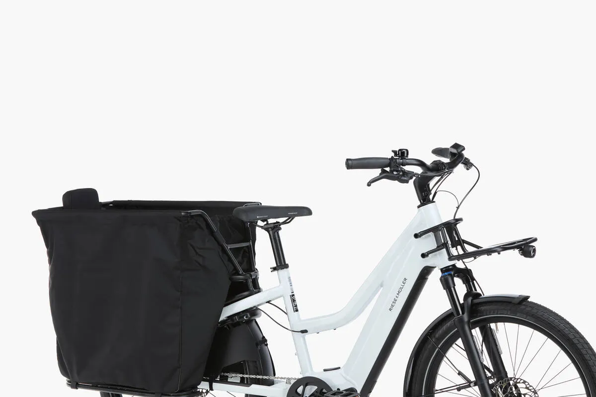 Close-up of Riese & Müller Multicharger2 GT Mixte touring in pearl white with carrier in black matt and bottom weather protection.