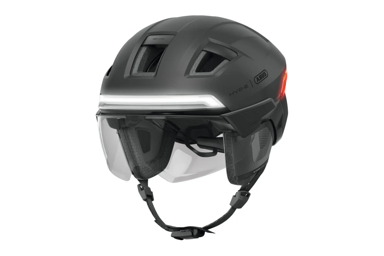 ABUS HYP-E ACE helmet in volcano titan, three-quarter front view with ear pads fitted