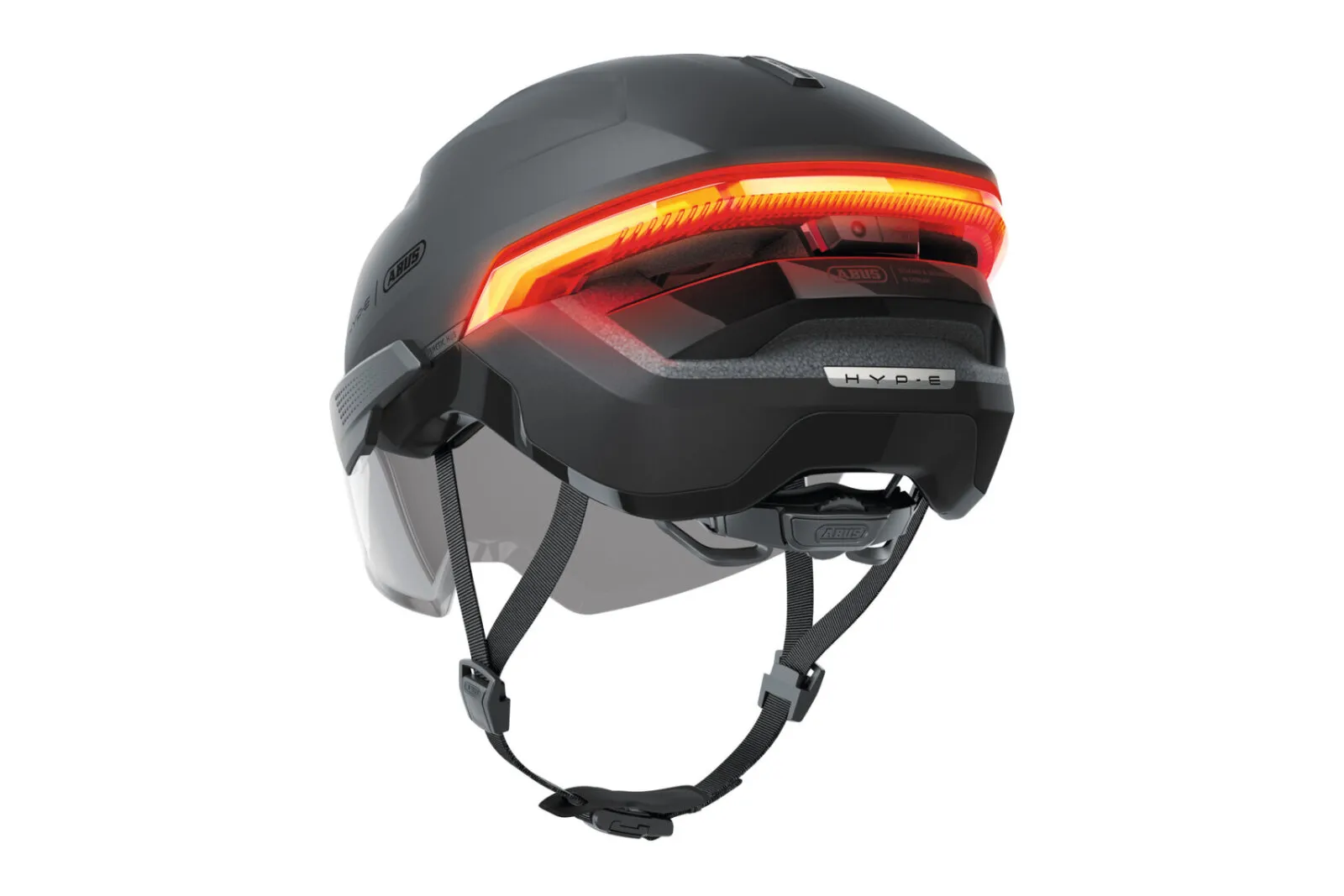 ABUS HYP-E ACE helmet in volcano titan, three-quarter rear view showing indicator lights