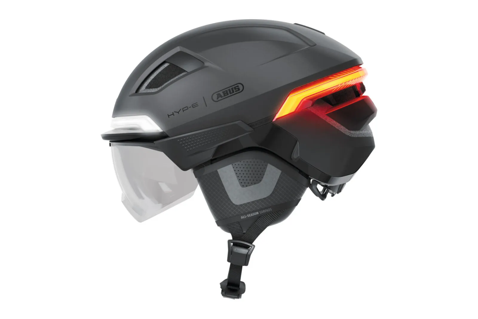 ABUS HYP-E ACE helmet in volcano titan, side view with ear pads fitted