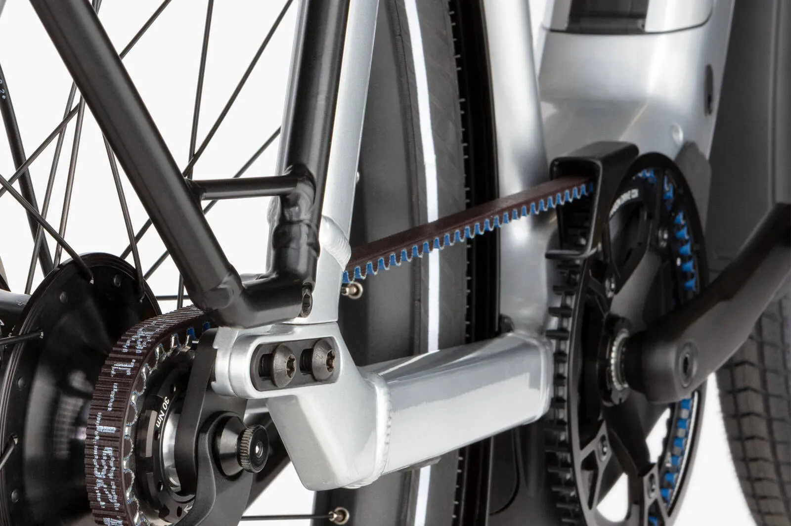 A cyclist riding the Riese & Müller Charger5 Mixte on an urban street.