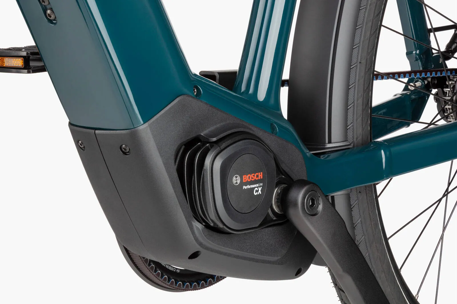 A cyclist enjoying the Riese & Müller Charger5 on a scenic countryside path.