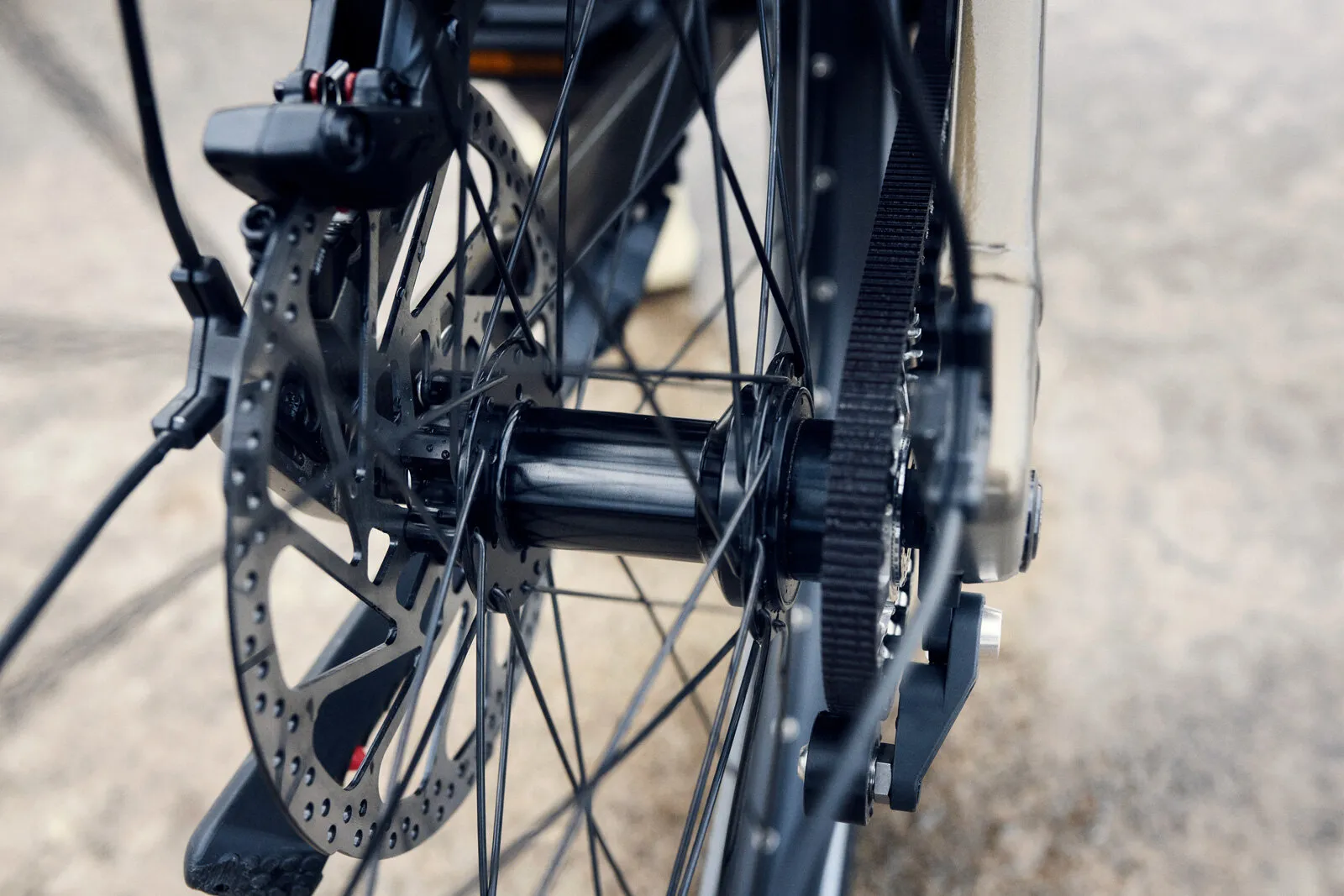 Riese & Müller Delite5 Pinion in amber with full accessories including pannier rack and front bag.