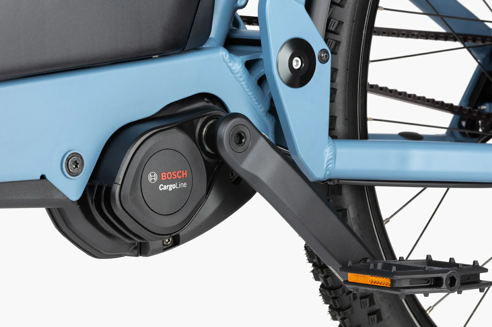 Close-up of the Load5 75 front suspension fork and integrated headlight.