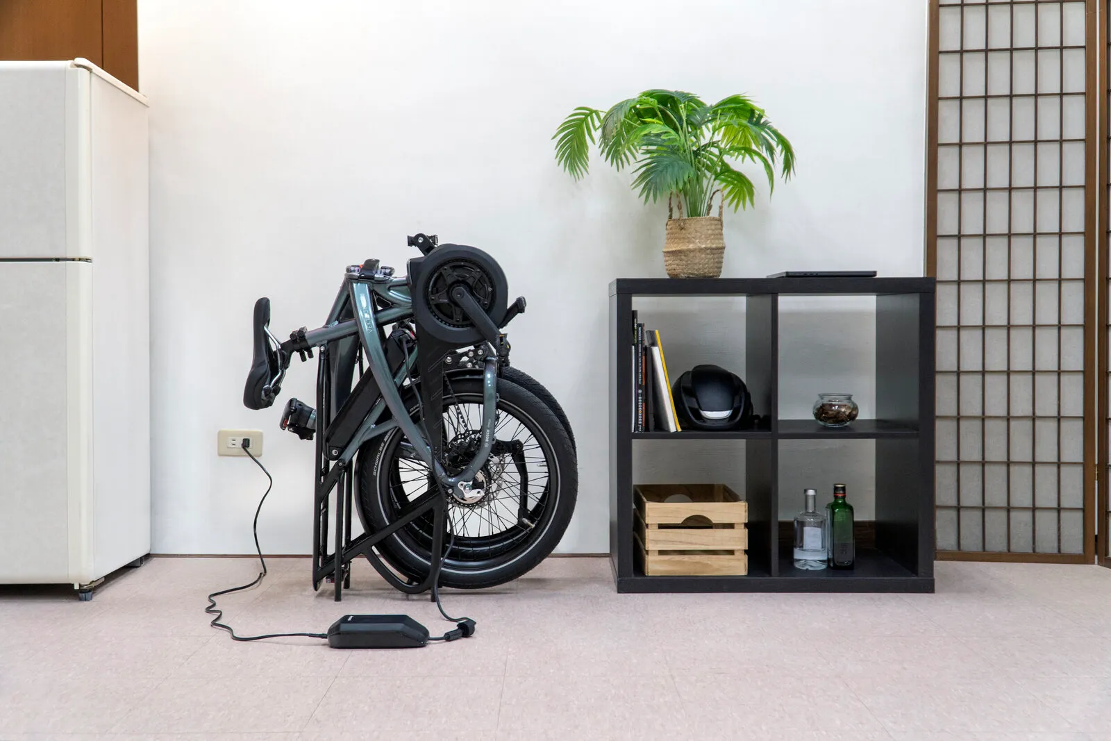 The folded Vektron charging from a standard socket at home.