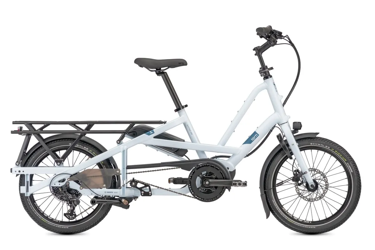 White Tern Quick Haul Long e-bike product shot showing side profile with 20-inch wheels, step-through frame, and rear cargo platform