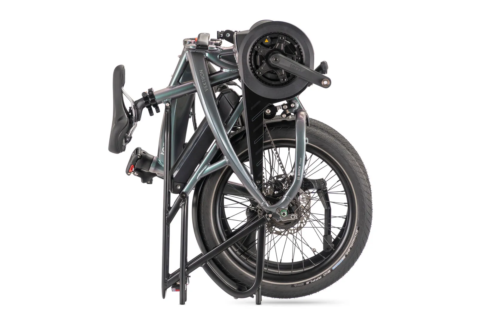 Tern Vektron P5i in urban verdant folded and standing upright on its rear rack.
