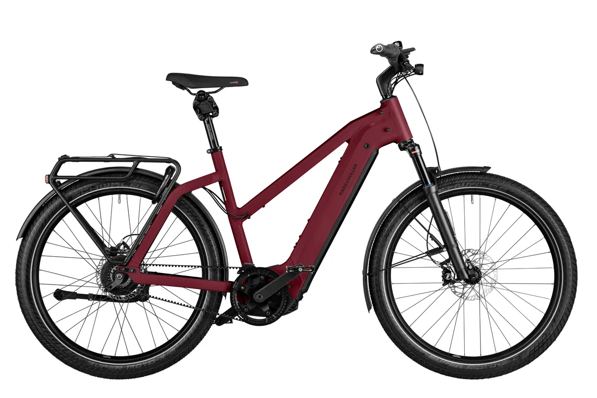 Riese & Müller Charger4 vario with mixte frame in dark red matt.