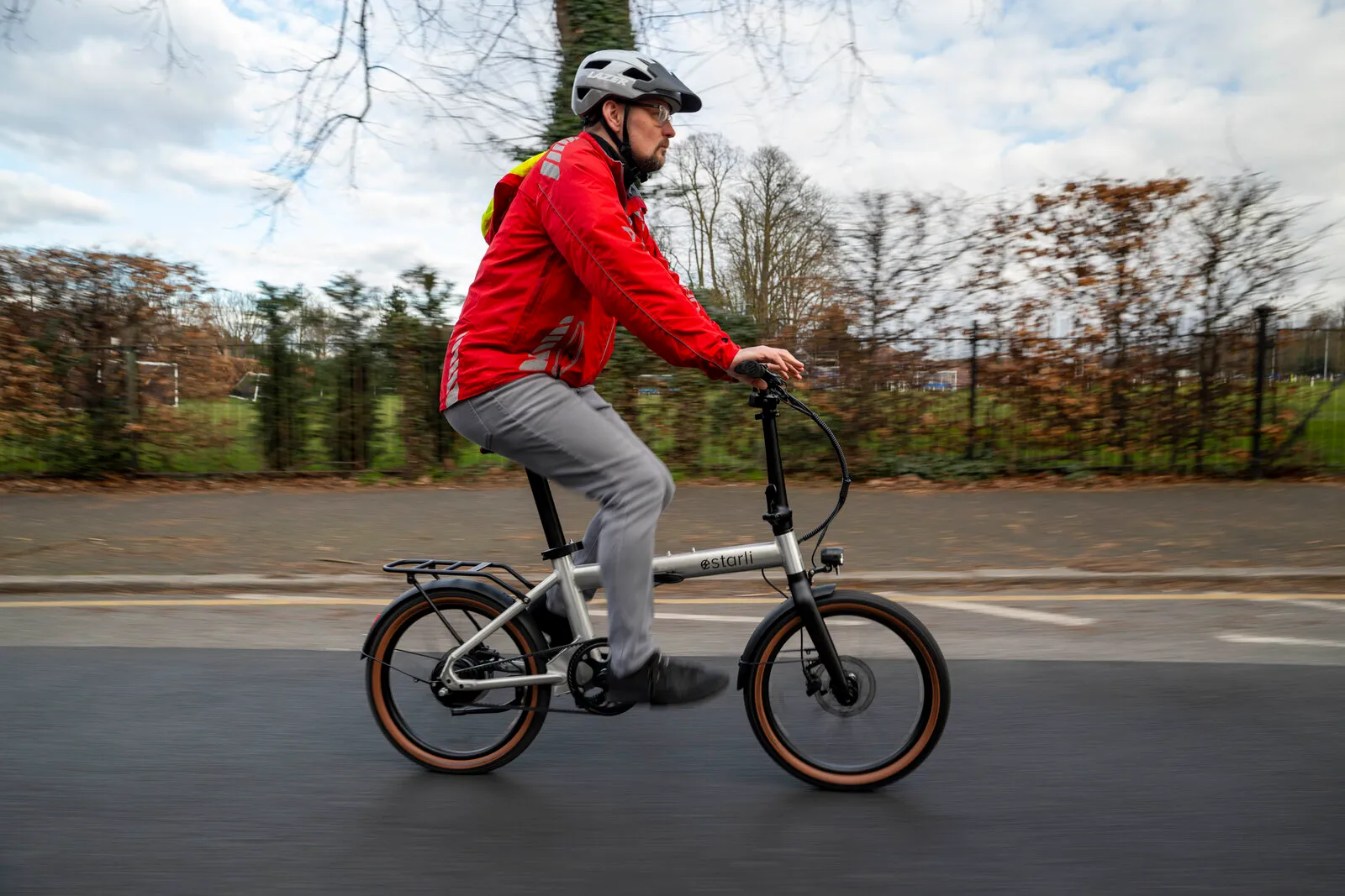 Estarli e20.X being ridden on a residential street.