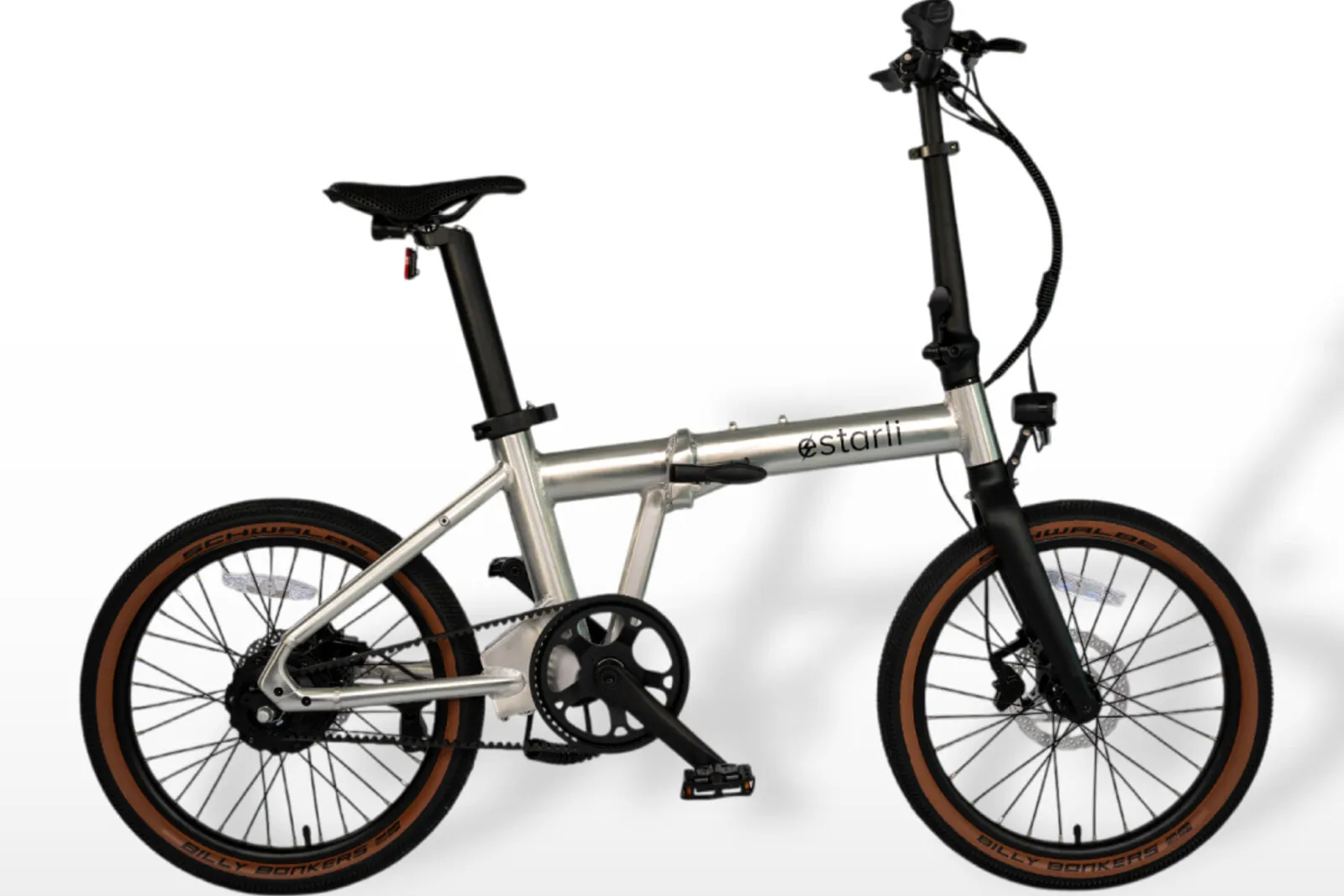 Estarli e20.X in UFO raw aluminium finish with tan wall gravel tyres.