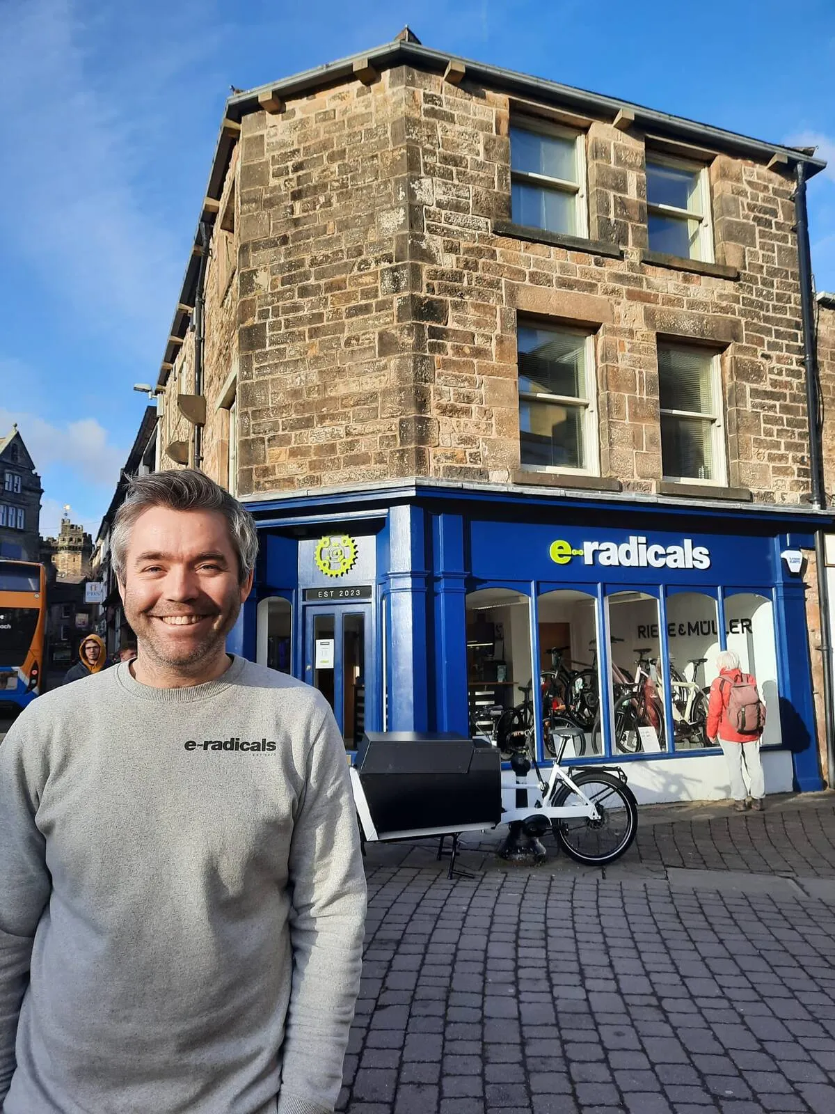 Jack outside the E-Radicals shop at 15 King Street, Lancaster.