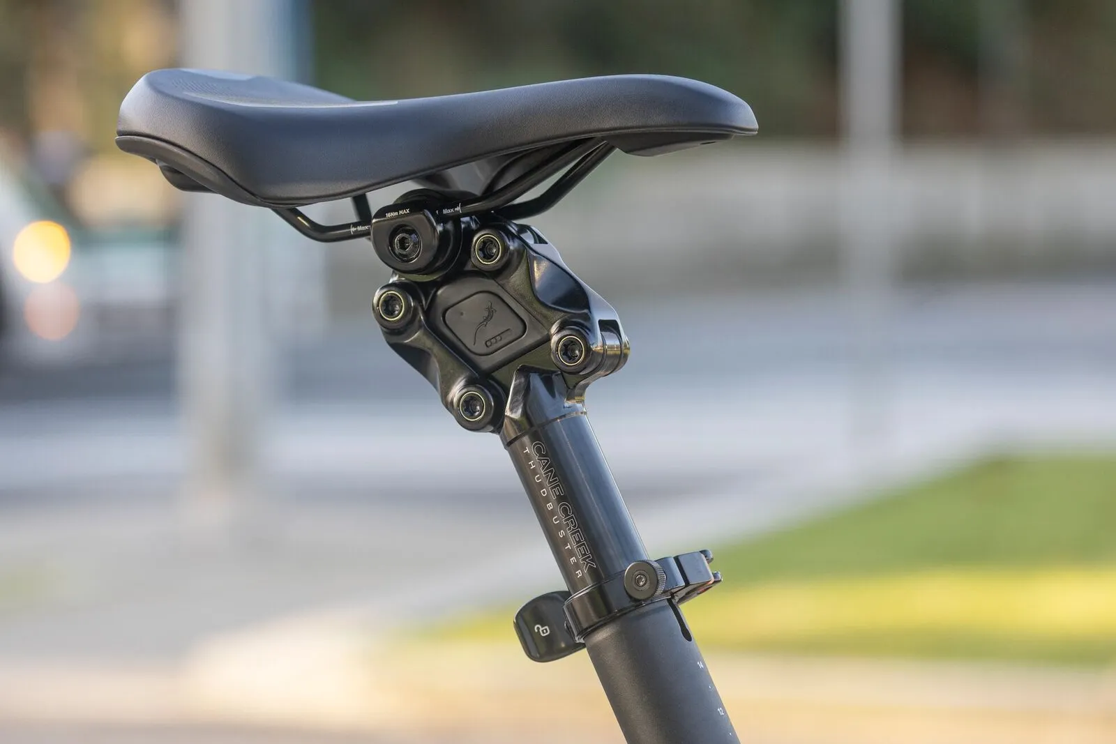 Close-up of the Cane Creek suspension seatpost beneath the saddle of a Tern GSD.