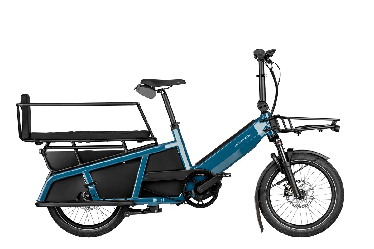 Riese & Müller Multitinker vario in petrol blue/black with safety bar kit and cargo front carrier.