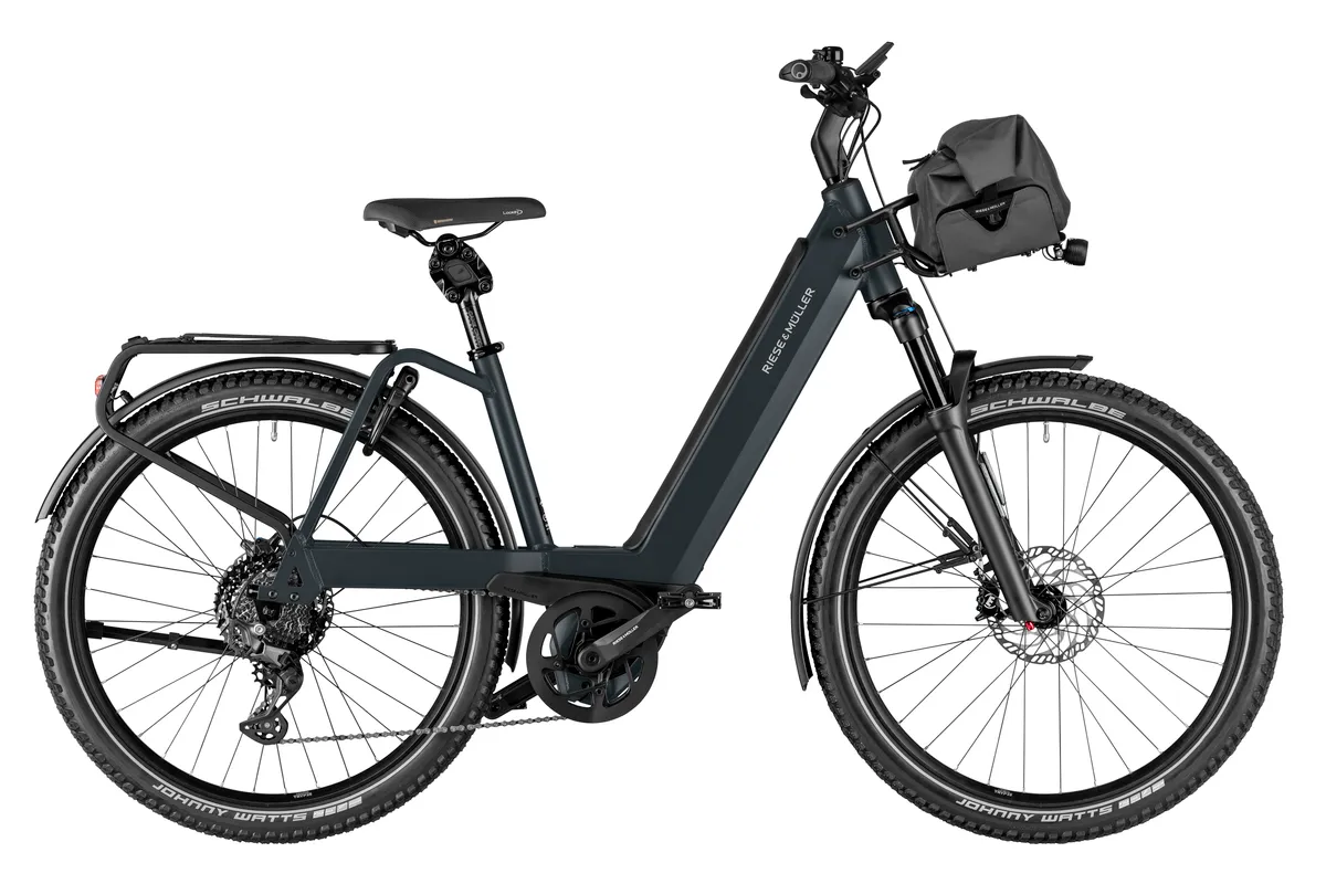 Riese & Müller Nevo4 GT touring in dark grey metallic with GX package and front carrier with bag.