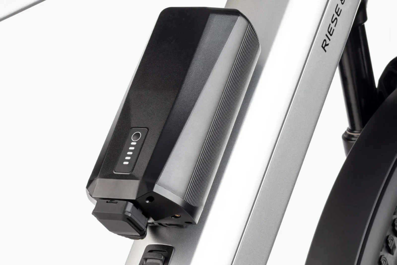 Pinion range extender, a 240 Wh battery mounted at the bottle-cage point on a Riese & Müller e-bike