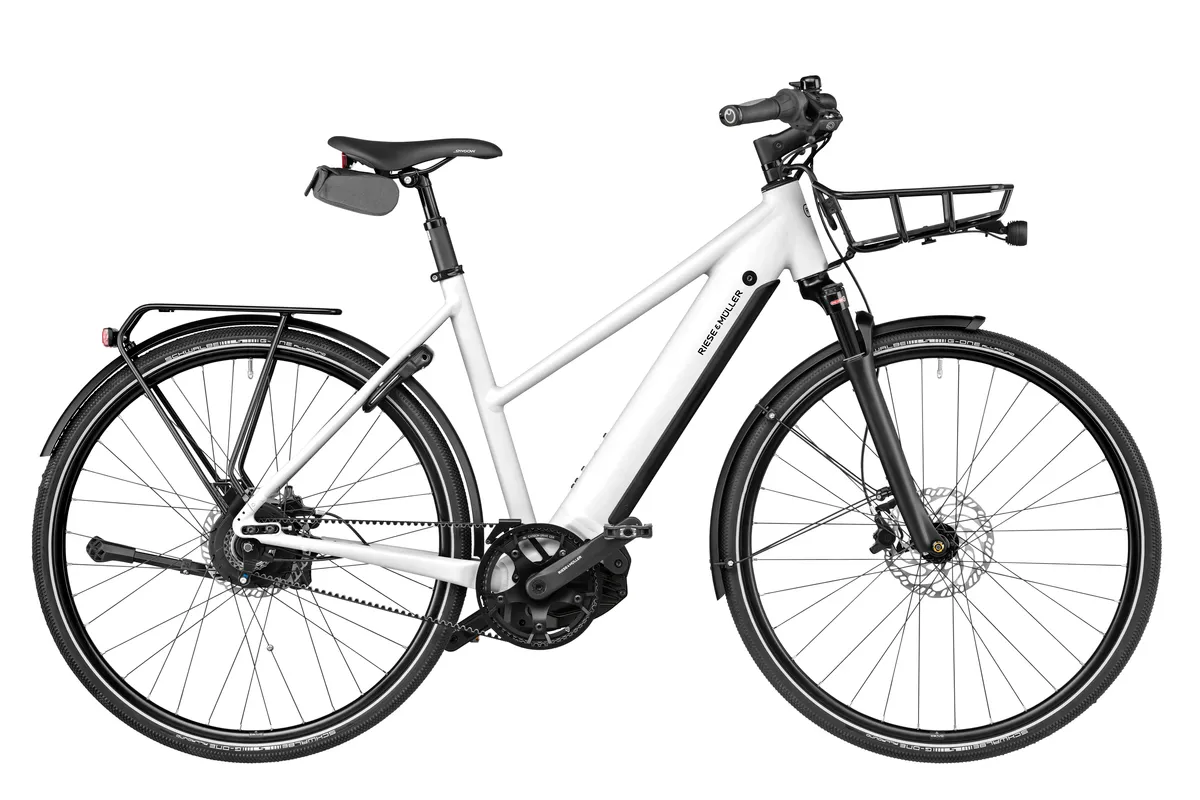 Riese & Müller Roadster4 vario with mixte frame in crystal white with carrier, front carrier, comfort kit and lock.