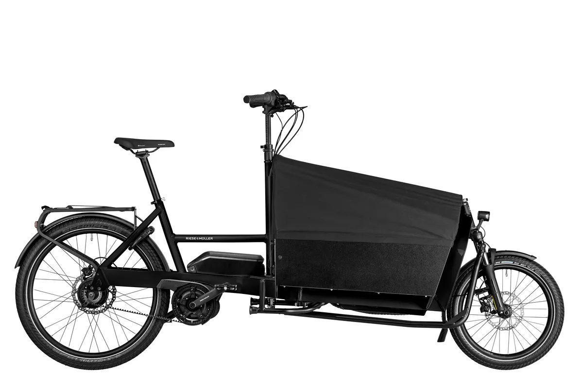 Riese & Müller Transporter2 65 vario in black with box and tarpaulin.