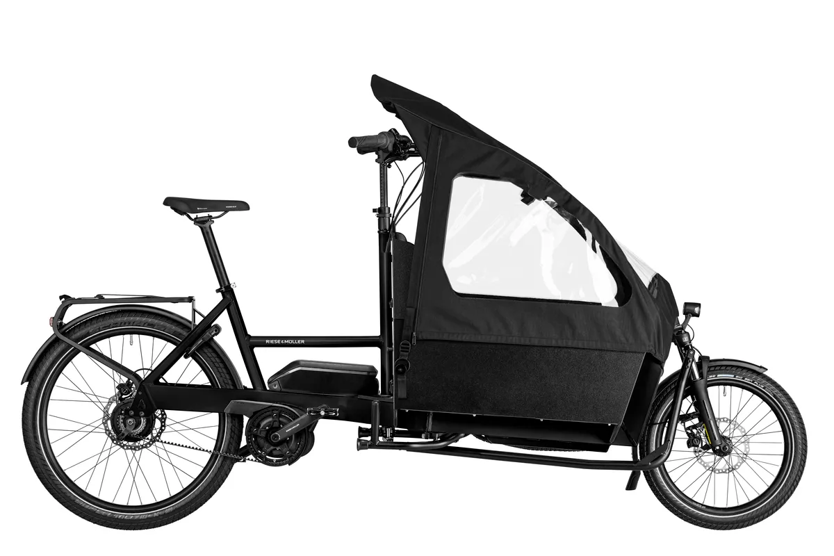 Riese & Müller Transporter2 65 vario in black with box, double rear child seat and child cover.