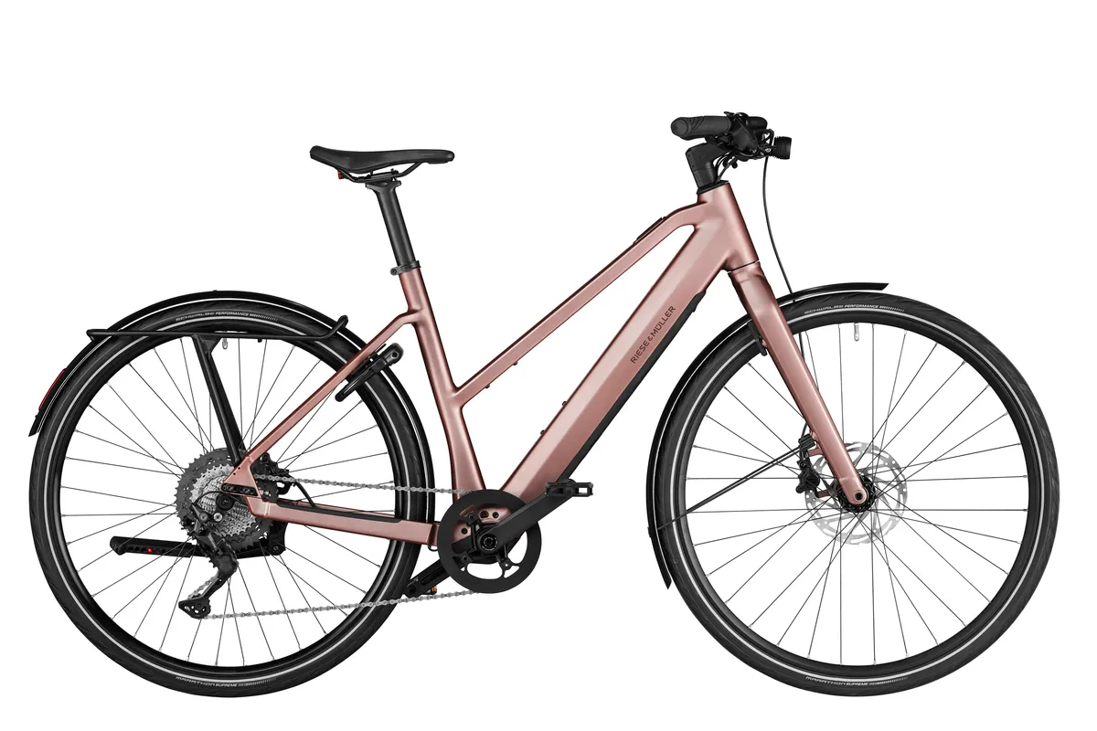Riese & Müller UBN Seven touring in rose pink with comfort kit.