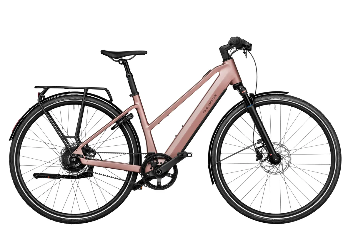 Riese & Müller UBN Seven vario in rose pink with carrier.