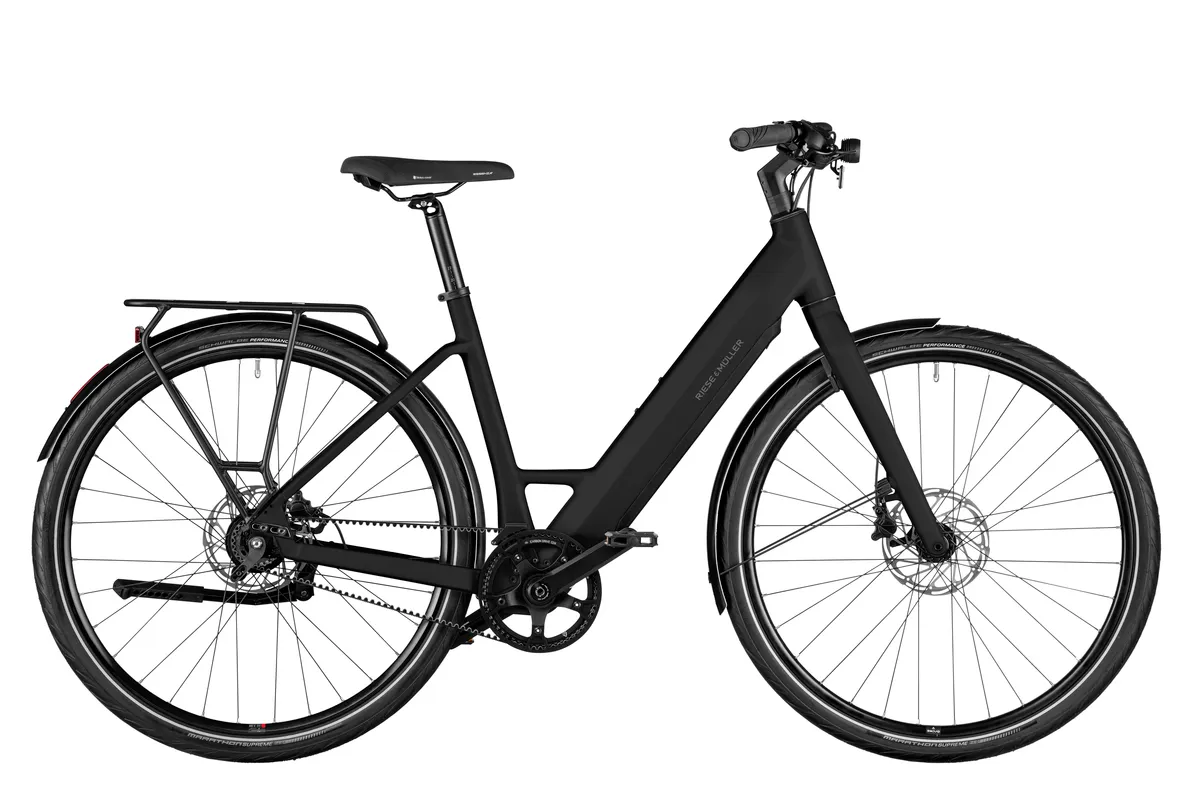 Riese & Müller UBN Six silent in black matt with comfort kit and carrier.